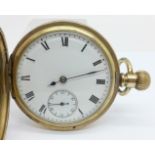 A gold plated half-hunter Waltham Traveler pocket watch