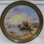 A French late 19th Century charger with a coastal scene, 45cm