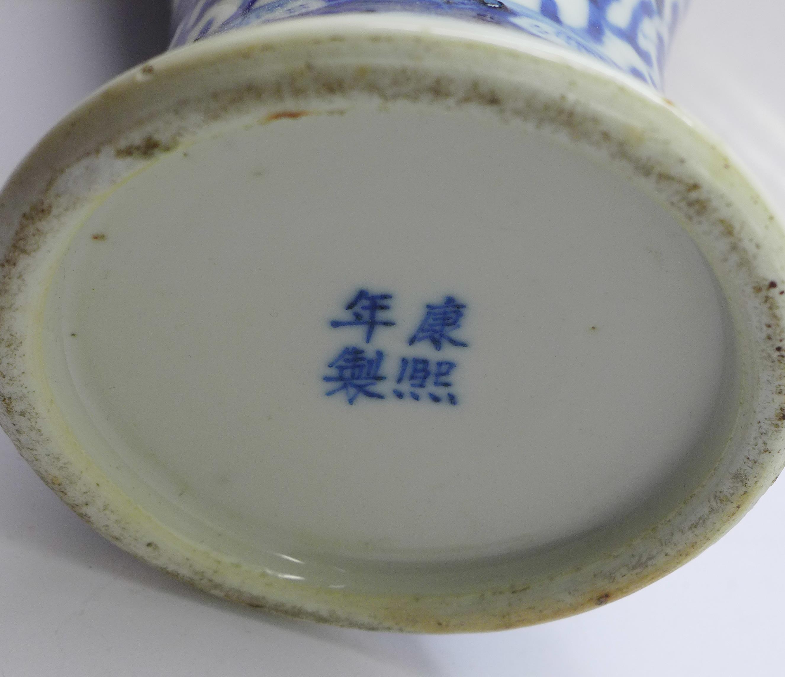 A Chinese blue and white vase with four character mark to base, rim restored, 31cm and a pair of - Image 5 of 5