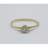 A 9ct gold solitaire ring with white stone, 0.7g, O