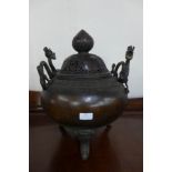 A large oriental bronze koro and cover, 45cms h