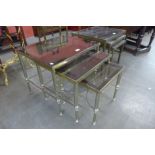 An Italian brass and glass topped nest of tables