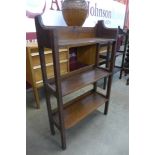 A small Arts and Crafts oak bookcase