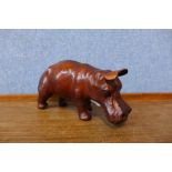 A small brown leather hippopotamus