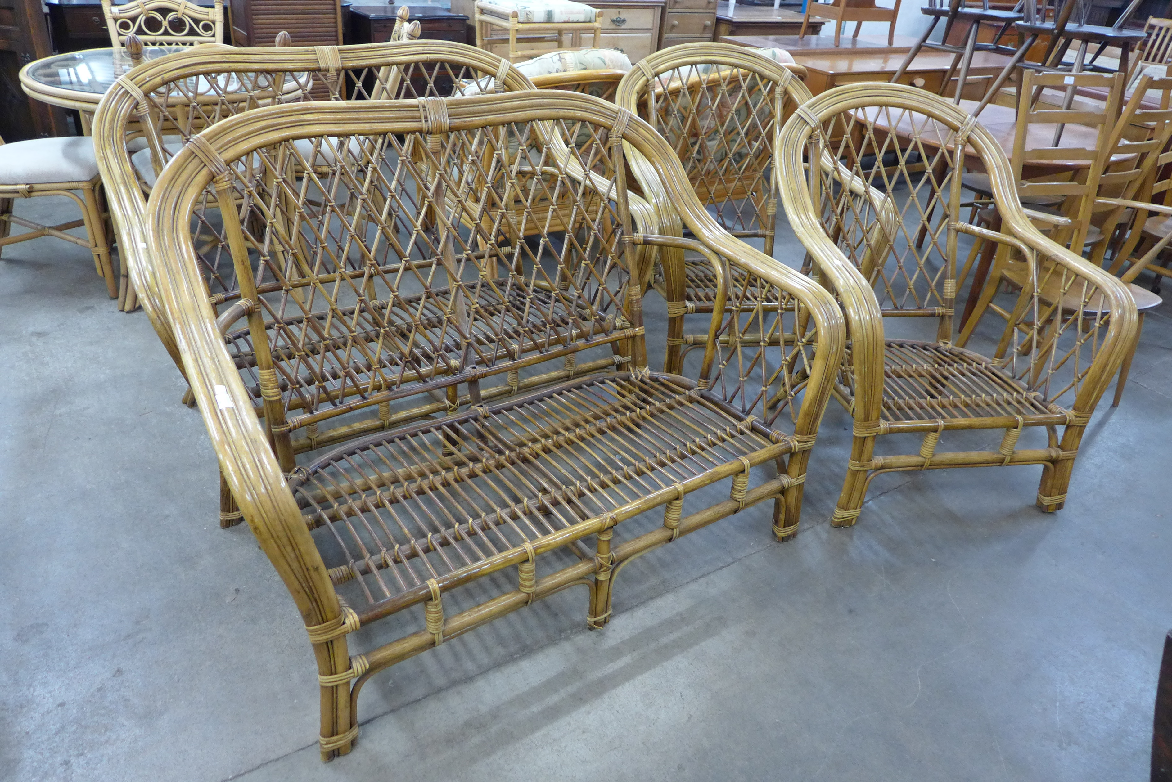 A bamboo four piece lounge suite