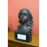 A small French style bronze bust of a lady, on green marble socle, 15cms h