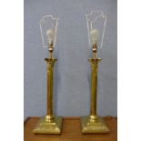 A pair of brass Corinthian column table lamps