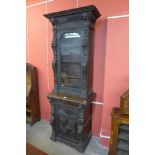 A 19th Century Flemish carved oak bookcase