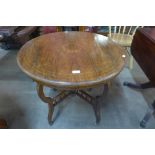 An Edward VII inlaid rosewood circular centre table