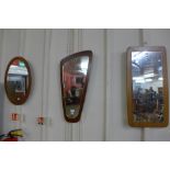 Three teak framed mirrors