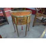 A French Louis XV style walnut and gilt metal mounted petit commode