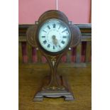 A French Art Nouveau inlaid mahogany mantel timepiece