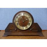 An Art Deco oak mantel clock