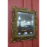 A 19th Century Italian carved gilt wood Florentine mirror