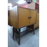 A teak record cabinet