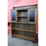 An Arts and Crafts oak open bookcase