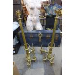 A pair of Romanesque brass andirons