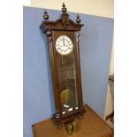 A mahogany double weight Vienna wall clock