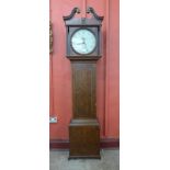 A 19th Century oak 30 hour longcase clock, the painted circular dial signed J. Wainwright,