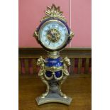 A French gilt metal and cobolt blue porcelain mantel timepiece