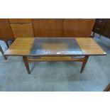 A G-Plan Fresco teak and glass topped coffee table