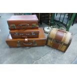 Three vintage suitcases and one other