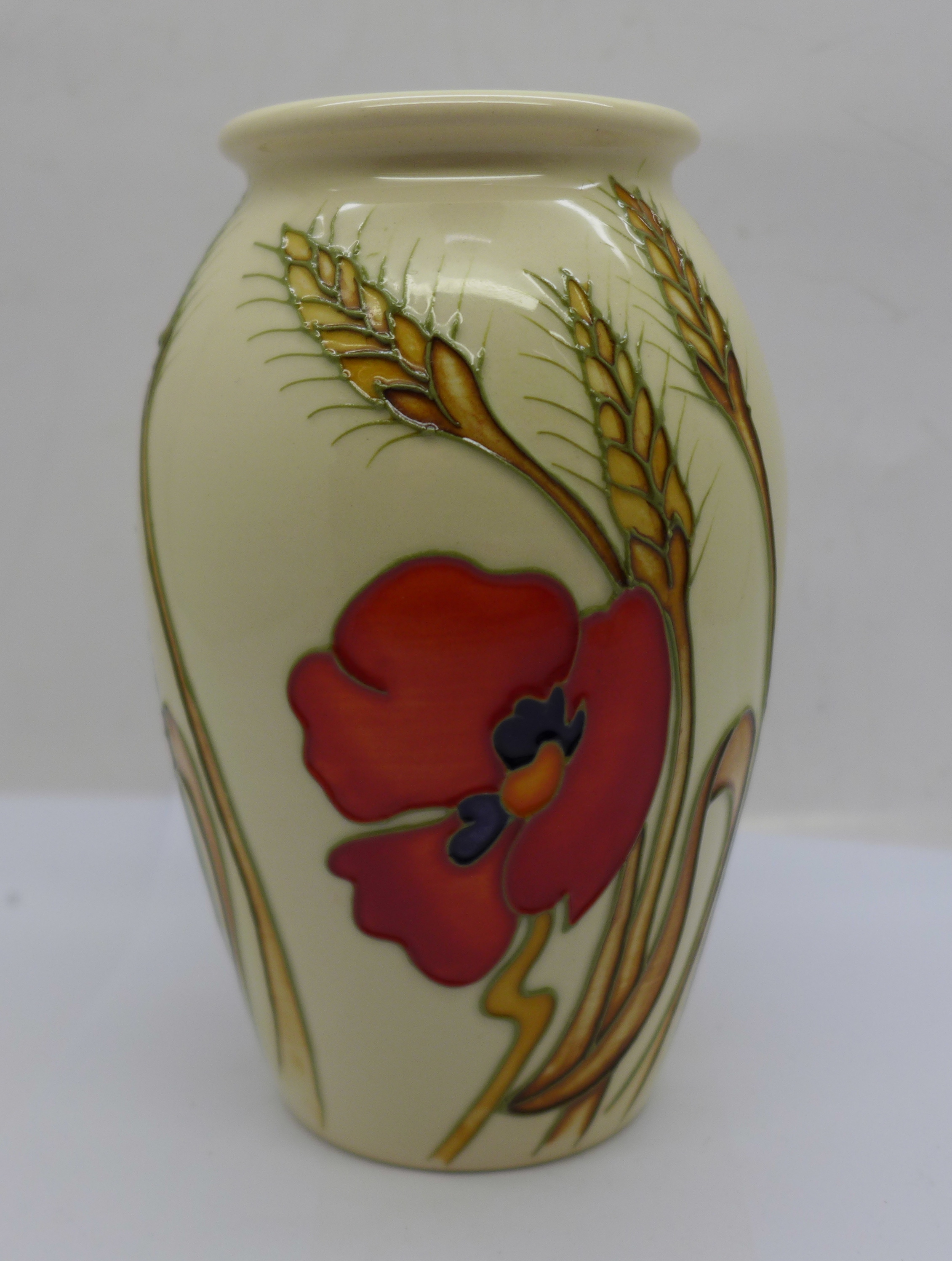 A Moorcroft poppy vase, 2009, 13cm