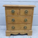 A small pine chest of drawers