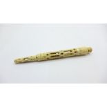 A carved bone dip pen with Stanhope (Crystal Palace)