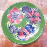 A Moorcroft Anemone plate, boxed, 26cm
