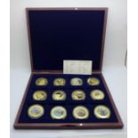 A 2021 twelve coin Cu gold plated collection 'Mutiny on The Bounty', proof quality in wooden case