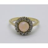 An early 20th Century 18ct gold, opal and diamond cluster ring marked 18ct, 3.1g, L/M