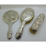 A Reynolds Angels decorated silver mirror and two brushes, a/f