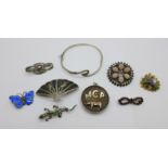 A Victorian silver brooch set with six shells, a silver and enamel butterfly brooch, pin a/f, a
