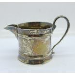 A silver jug, 42g