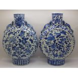 A pair of Chinese moon flasks, one a/f, 26.5cm