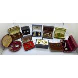 A pair of silver cufflinks and a quantity of other cufflinks, boxed