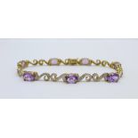 A 9ct gold, amethyst and diamond bracelet, 9.7g