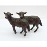 A bronze figure of two lambs, 9cm wide