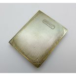 A silver case in the form of a book, bears initials, Birmingham 1929, 120g, 82mm x 66mm