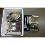 A box of cased cutlery and silver plated items including a cased set of fish servers