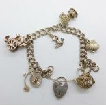 A silver charm bracelet, 33g