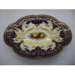 A Royal Worcester dish, hand decorated with fruit, signed Sebright, width 27cm