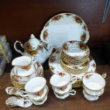 Royal Albert Old Country Roses tea and dinnerwares, six setting, teapot, cream, sugar, 6 cups, 8