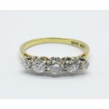 An 18ct gold, platinum set five stone diamond ring, 2.6g, N