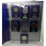 Uncirculated coins in new change checker binder, 7 x £5 coins, 2 x £2 coins, all on cards, coins