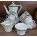 A Noritake Art Deco 15 piece coffee service in cream/white with gilding, circa 1910, one cup with