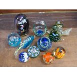Seven glass paperweights, three glass animals and a glass basket