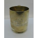 A silver mug with inscription dated 1975, 259g