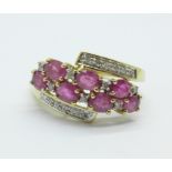 A 9ct gold, ruby and diamond crossover ring, 2.8g, Q